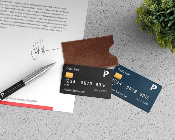 Top View Mockup of Two Credit Cards with Leather Holder