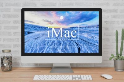 iMac Placing on Wooden Table Mockup